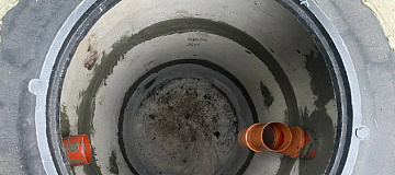 Двухкамерный септик из ЖБ колец фото