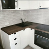Угловая кухня с фасадами из МДФ, покрытыми пленкой soft-touch фото 4