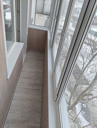 Остекление балкона с утеплением и отделкой фото 2